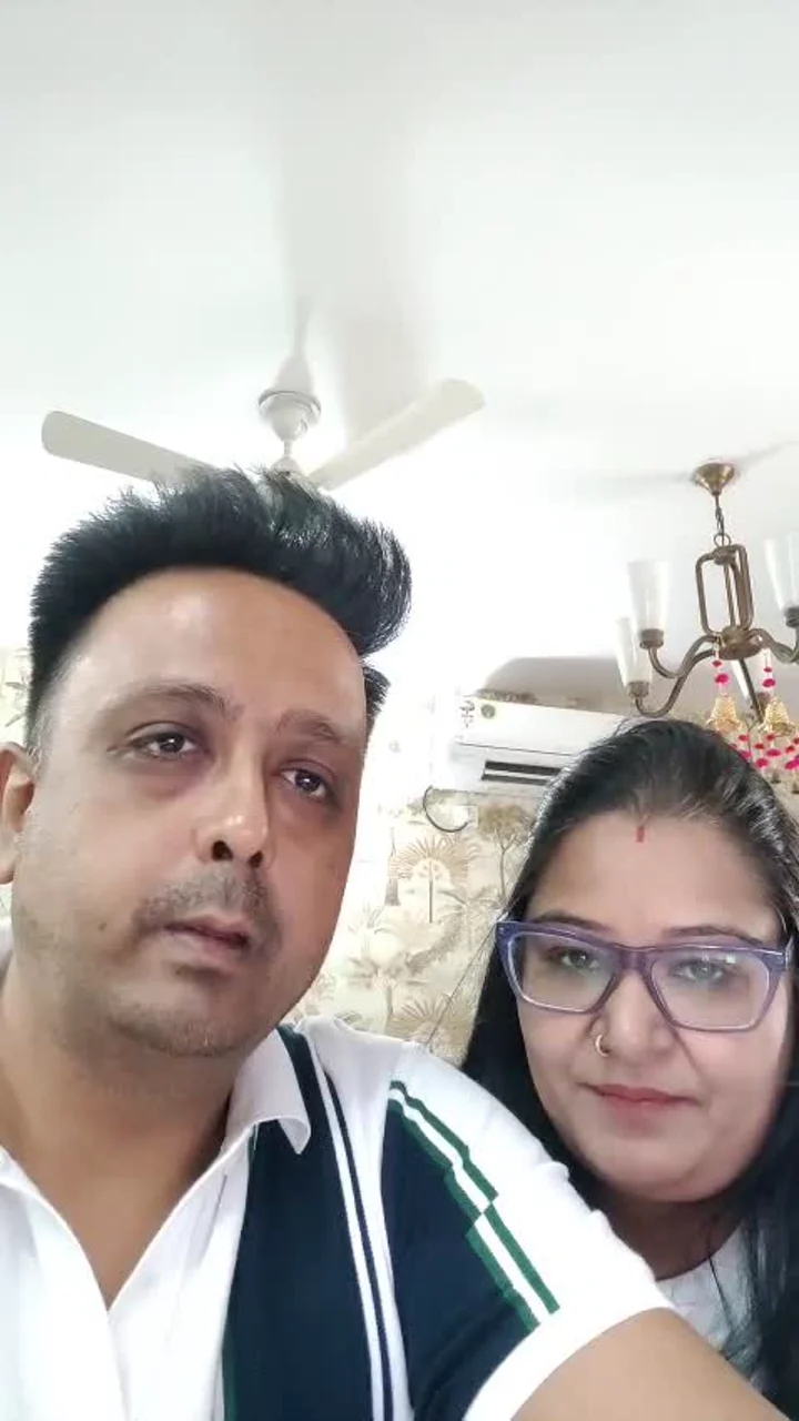 Manish G. and another person in a client video
